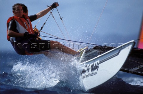 Crew on trapeze on Hobie Cat 16