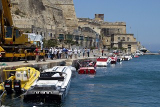 29/5/04. Malta, Valletta. The fleet of powerboats waits patiently on the dock for the rough seas of 4 metre waves to settle, for the first race around the island