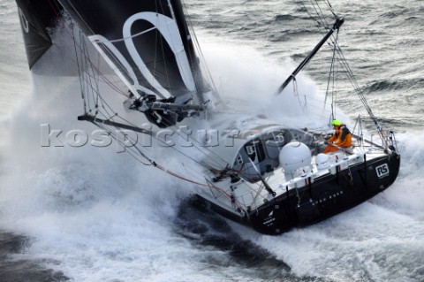 Vendee Globe Open 60 yacht Hugo Boss skippered by Alex Thomson powering through rough seas in strong