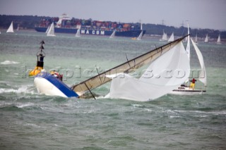COWES, ENGLAND - AUGUST 1: The blue hulled yacht Runaway broaching during a gust of wind on Day 4 of Skandia Life Cowes Week 2006. (Photo by Kos/Kos Picture Source via Getty Images)