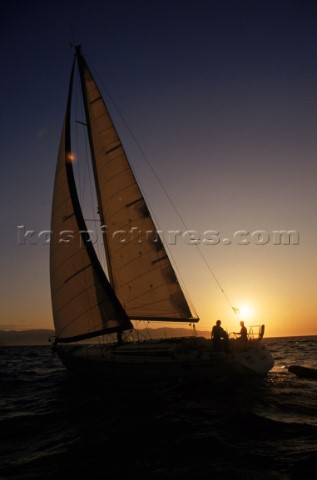 Sailing vessel at sunset Joanna B PinneoAurora PhotosKos Pictures