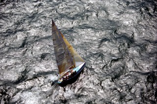 Wings of Oracle (GBR) Admirals Cup 91 Wings of Oracle sailing over a texture metallic open sea