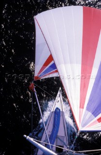 Masthead view of bowman on 12m Americas Cup yacht