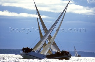 Crossing tacks Long Island Regatta  Two IMS racing yachts cross tacking under a cloudy sky