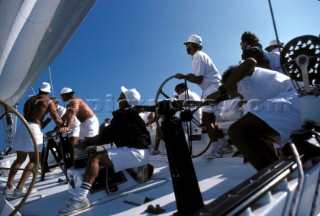Crew onboard racing yacht
