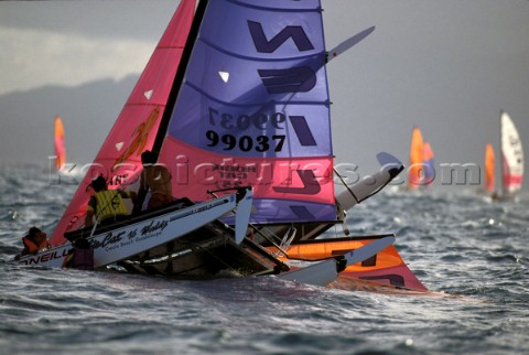 Two hobie cats collide in the middle of the race course