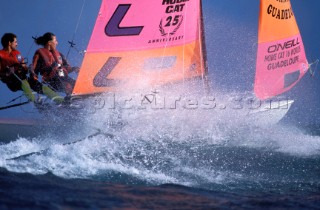 Man and woman on Hobie Cat