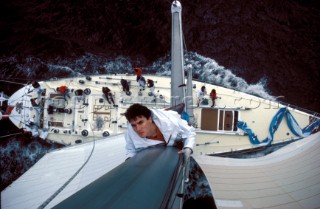 Rock star Simon Le Bon at the masthead of his Maxi yacht Drum.