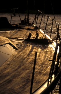 A moored cruising yacht at sunset