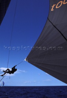 Bowman prepares to blow the clew of a sail on board Wally yacht Tikatitoo