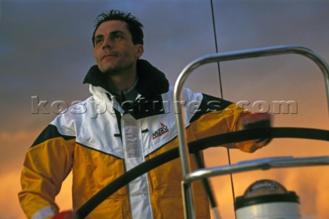 Sailing  St Barts Sailor at the helm of a yacht