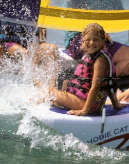 Children sailing a Hobie Cat