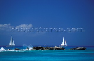 Yachts cruising in a Caribbean sea off the coast of St Martin