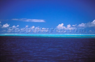 Waves breaking over sandbar - Tahiti, French Polynesia