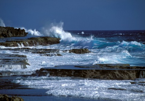 Sea crashing against rocks Tonga