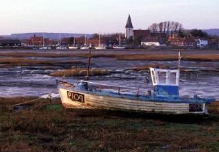 Old beached fishing boat, Bosham harbour, UK