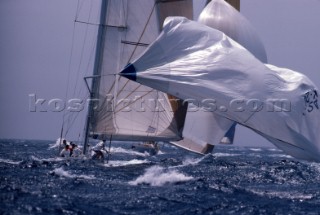 12 Metre racing yacht drops its spinnaker