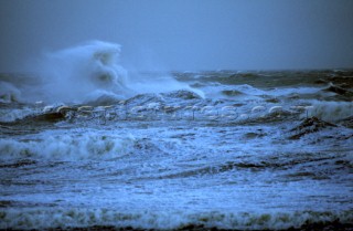 Pounding waves in a stormy sea