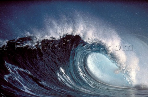 Large breaking wave on the surf line