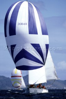 Yacht sailing under spinnaker