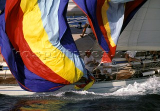 Crew hauling in a spinnaker, Antigua Race Week