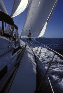 Blue Water Cruising Side deck of yacht under full sail