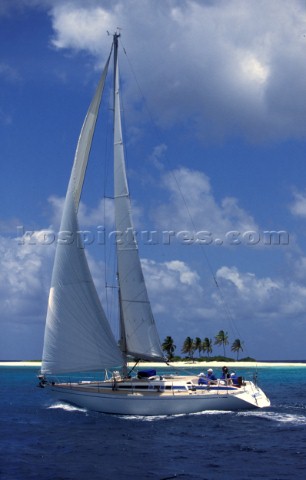 A Swan 40 under full sail off Sandy Island off Anguilla