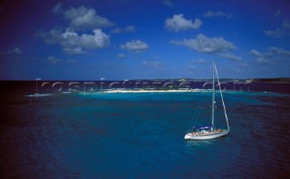 A Swan at anchor near Sandy Island, Anguilla, in the Caribbean