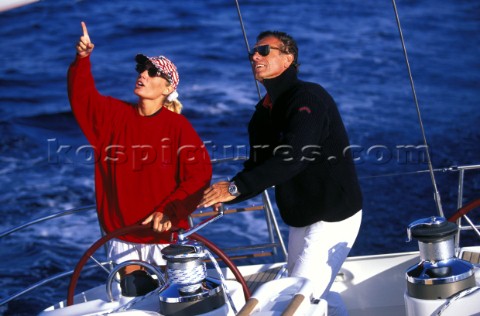 Couple on a cruising yacht in Europe