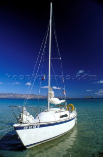 Cruising yacht anchored onto a beach in the Sea of Cortez in Mexico