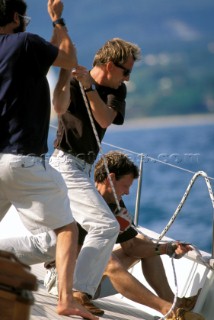 Crew hoisting sail