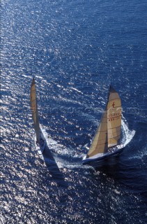 Two Americas Cup yachts dialling up on the race course