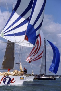 Fleet racing down wind under spinnaker