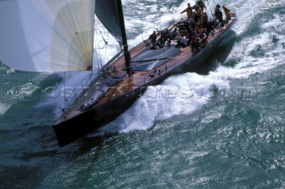 Maxi yacht Stealth sailing down wind under full power