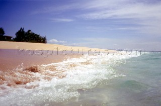 Waves lapping on deserted tropical beach