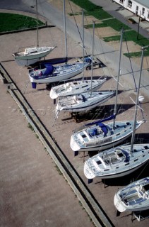 Sailing yachts on the hard at Hamble Point Marina, Hampshire, UK