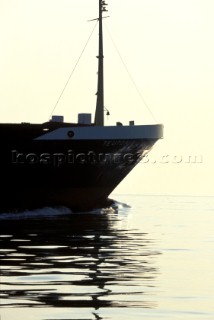 Bow of ship reflected in water