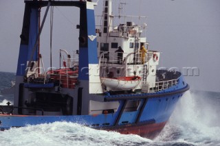 Bow of Commercial Ship In Rough Seas