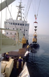 Lifting a cardinal buoy out of the water for maintenance work