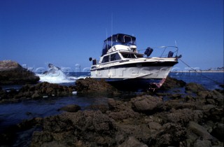 Power boat on the Rocks