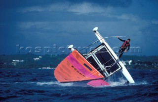 Crew about to fall into the water after capsizing his Hobie Cat 16