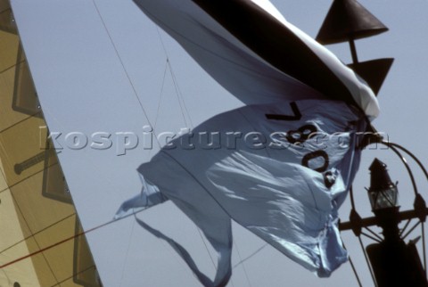 Disaster as a yacht catches its spinnaker on a cardinal bouy