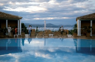 Sky reflected in luxury swimming pool