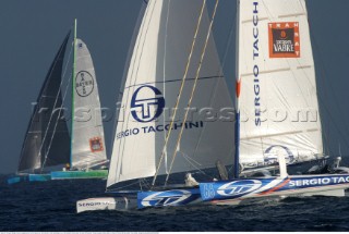 Open 60 Trimaran Sergio Tacchini skippered by Karine Fauconnier and Damian Foxall leads Bayer out to the english channel after the start of Multihull, Transat Jacques Vabre 2003, Le Havre, France. 5th Nov 2003.