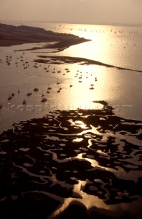 Aerial view of boats at low tide