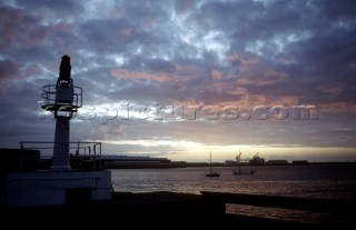 Dawn over colours in the sky over a lightship