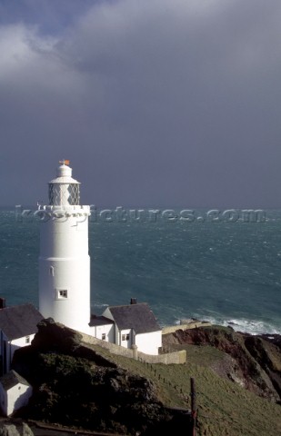 Lighthouse perchec on a cliff