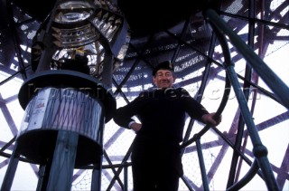 Mike OSulivan, at beside the lamp at the top of Eddystone lighthouse, Devon, UK