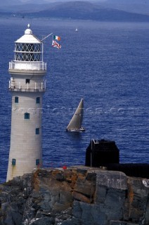 Yacht rounding the Fastnet rock in the Irish Sea