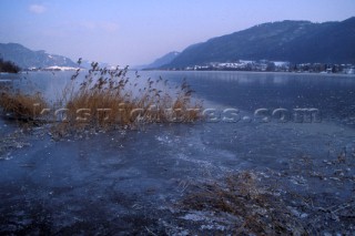 Skaters on frozen lake, Southern Austria